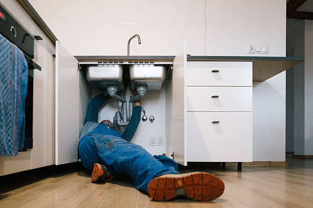 Professional Emergency Plumber technician working in Bergholz, OH